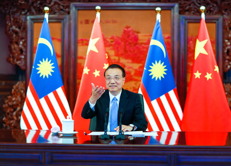  李克强同马来西亚总理穆希丁举行视频会晤