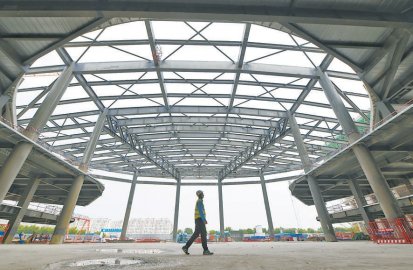 新国展二期下月钢结构全面封顶 “紫金丝带”雏形显现